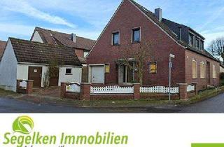 Haus kaufen in 28816 Stuhr, Ein- bis Zweifamilienhaus mit zwei Garagen, Carport und großem Garten