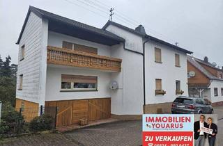 Haus kaufen in 66564 Ottweiler, Ottweiler - Freistehendes und geräumiges Zweifamilienhaus mit Balkon, Garten, Garagen in Ottweiler