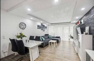 Wohnung kaufen in 79115 Freiburg, Modernisierte 3,5 Zimmer Wohnung mit zwei Balkonen und Einbauküche in Freiburg Weingarten