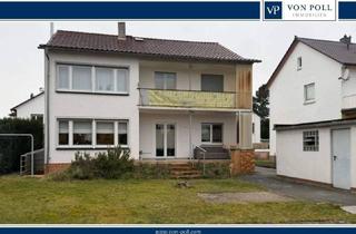 Haus kaufen in 64584 Biebesheim, Biebesheim am Rhein - Zweifamilienhaus in solider Bausubstanz mit großem Grundstück
