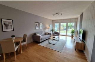 Wohnung kaufen in 61350 Bad Homburg, VON POLL - BAD HOMBURG: Zwei-Zimmer-Wohnung mit Garten und Tiefgaragenstellplatz