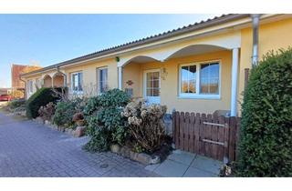 Haus kaufen in 19073 Wittenförden, Gepflegtes, barrierefreies Reihenmittelhaus im Bungalowstil mit Wintergarten und Doppelcarport