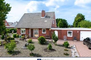 Haus kaufen in 26524 Hage, Gepflegte Immobilie mit Garage in zentraler Lage von Hage