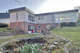 Haus kaufen in 24113 Molfsee, Molfsee – Außergewöhnlich gepflegte Immobilie mit Wintergarten, viel Platz und großem Grundstück