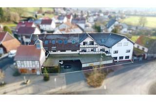 Mehrfamilienhaus kaufen in 63607 Wächtersbach, Attraktives Mehrfamilienhaus mit 8 Wohnungen + Werkstatt und Lagerhalle!