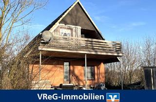 Einfamilienhaus kaufen in 24594 Rade, Feldrandlage: Vermietetes Einfamilienhaus mit Sanierungsbedarf in Rade b. Hohenwestedt