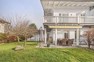 Wohnung kaufen in 83125 Eggstätt, Exklusive Wohnung auf drei Etagen mit Bergblick und eigenem Garten