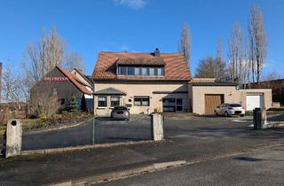 Wohnung kaufen in 38640 Goslar, Goslar - Geräumige Erdgeschosswohnung mit großem Garten und Garage