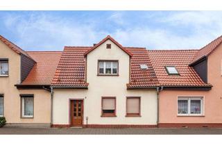 Reihenhaus kaufen in Victor-Blüthgen-Straße, 06780 Zörbig, Günstiges Reihenhaus mit Innenhof und Ausbaupotenzial in ruhiger Lage von Zörbig