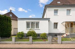 Doppelhaushälfte kaufen in 38667 Bad Harzburg, Doppelhaushälfte mit Garten und Garage