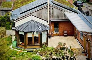 Einfamilienhaus kaufen in 25361 Krempe, Nachhaltiger Bungalow mit Wintergarten, Garage und Garten