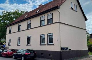 Doppelhaushälfte kaufen in 65795 Hattersheim, Hattersheim am Main - Sanierungsbedürftiges MFH mit 6 Einheiten, Anbau und 7 Garagen in Hattersheim