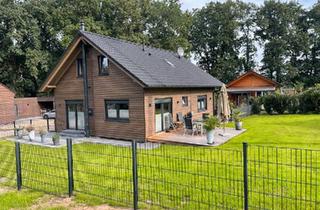 Haus kaufen in 48480 Spelle, Spelle - Traumhaftes modernes Holzhaus im Erholungsgebiet