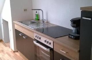 Wohnung kaufen in 40670 Meerbusch, Meerbusch - Modernisierte 3-Zimmer-DG-Wohnung mit Süd-Terrasse