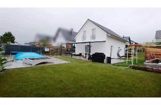 Einfamilienhaus kaufen in 35447 Reiskirchen, Reiskirchen - Einfamilienhaus in ruhiger Lage mit Garten und Pool