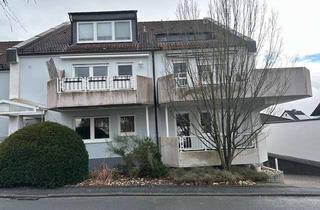 Wohnung kaufen in 61273 Wehrheim, Nur eine Stufe zum Glück!