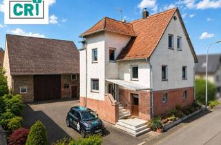 Einfamilienhaus kaufen in 35274 Kirchhain, Raum für Wohnen und Hobby: Einfamilienhaus mit Scheune und Werkstatt