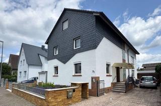 Anlageobjekt in 64560 Riedstadt, Großzügiges und gepflegtes Zweifamilienhaus mit Garten, Terrasse, und Garagen sowie Ausbaupotenzial