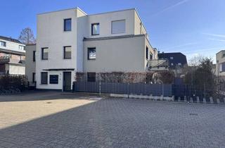 Wohnung kaufen in 51381 Lützenkirchen, Hochwertige und charmante Erdgeschosswohnung mit Garten.