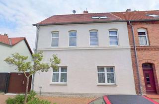 Einfamilienhaus kaufen in 19322 Wittenberge, Charmantes Wohnen auf drei Ebenen – modernisiertes Einfamilienhaus in ruhiger Seitenstraße