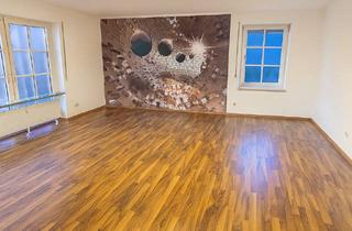 Wohnung kaufen in 21614 Buxtehude, Stilvolle Erdgeschosswohnung mit Naturblick und Carport