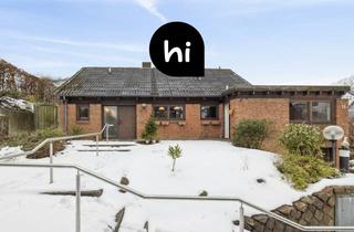 Haus kaufen in 24340 Eckernförde, Charmanter Bungalow mit Kamin und großem Gestaltungspotential - in küstennaher Lage