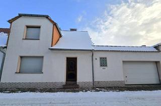 Haus kaufen in 39249 Barby, Charmantes Reihenmittelhaus mit Garage in ruhiger Lage von Barby