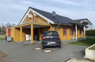 Haus mieten in Dr.-Grote-Weg 22, 32369 Rahden, Neues Blockhaus (3 Zi.) mit Carport, Geräteschuppen und Garten in Rahden – Bezug ab 01.06.2026