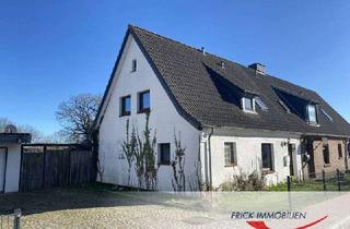 Doppelhaushälfte kaufen in 23738 Lensahn, Lensahn - Doppelhaushälfte mit Garage und großem Garten