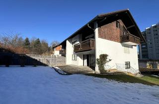 Doppelhaushälfte kaufen in 83301 Traunreut, Großzügige Doppelhaushälfte in zentraler Lage - Split-Level-Wohnen mit Süd-Terrasse und drei Garagen