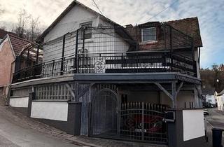 Einfamilienhaus kaufen in 61250 Usingen, Usingen - Außergewöhnliches Einfamilienhaus in Usingen OT