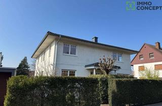 Einfamilienhaus kaufen in 65760 Eschborn, Stilvolle Premium-Immobilie mit großzügigem Raumkonzept, Au-pair-Apartment und PV-Anl., courtagefrei