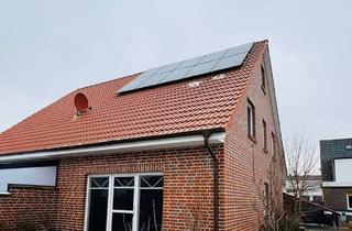 Doppelhaushälfte kaufen in 26506 Norden, Attraktive Doppelhaushälfte mit sonnigem Garten, PKW-Stellplatz und PV-Anlage