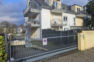 Wohnung kaufen in 61350 Bad Homburg, Exklusive Maisonettewohnung im „Haus-im-Haus“-Charakter mit Privatgarten & Outdoor-Küche