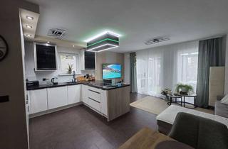 Wohnung kaufen in 61350 Bad Homburg, Hausgefühl statt Wohnung: Moderne 3-Zi.-Maisonette mit Garten, Terrasse & Balkon (BJ 2013)