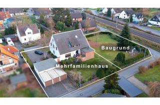 Mehrfamilienhaus kaufen in 32257 Bünde, Renditestarkes Mehrfamilienhaus mit 3 Wohneinheiten, 5 Garagen & 1 Baugrundstück in Bünde