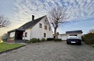 Mehrfamilienhaus kaufen in 32257 Bünde, Renditestarkes Mehrfamilienhaus mit 3 Wohneinheiten und 5 Garagen in Bünde
