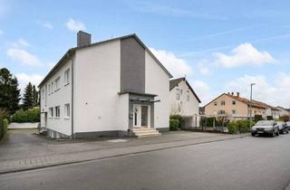 Mehrfamilienhaus kaufen in 65824 Schwalbach, Schwalbach am Taunus - Wohnen und Investieren: Saniertes Mehrfamilienhaus in attraktiver Feldrandlage in SchwalbachTs.