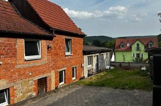 Einfamilienhaus kaufen in 97450 Arnstein, Arnstein - Sanierungsbedürftiges Einfamilienhaus mit Garten und Stellplätzen