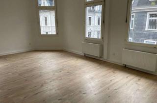 Wohnung kaufen in 42277 Wuppertal, Attraktive, vermietete 4,5-Zimmer-Wohnung in Wuppertal-Oberbarmen. Ideal für Kapitalanleger!