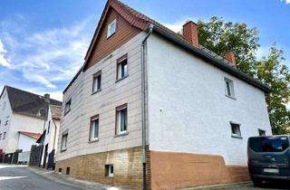 Einfamilienhaus kaufen in 61194 Niddatal, Charmantes Einfamilienhaus mit Remise und schönem Hof