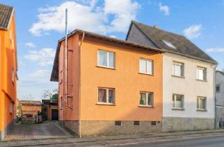 Einfamilienhaus kaufen in 66450 Bexbach, Attraktives Einfamilienhaus mit großer Terrasse und gepflegter Außenanlage.