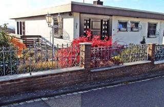 Haus kaufen in 56204 Hillscheid, Eleganter Huf-Bungalow mit Doppelgarage und Sauna in Hillscheid