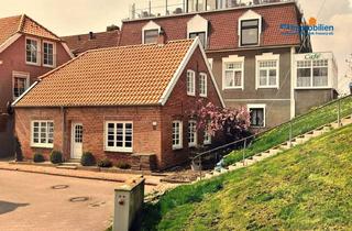 Haus kaufen in 26427 Neuharlingersiel, Charaktervolles Ferienhaus direkt hinterm Hafendeich