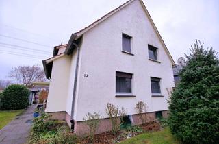Haus kaufen in 33790 Halle, Zweifamilienhaus mit Ausbaureserve und unverbautem Blick auf den Teuto