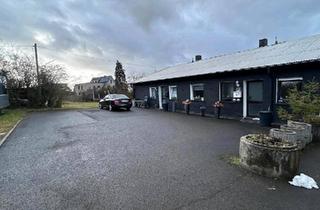 Haus kaufen in 97461 Hofheim, Hofheim in Unterfranken - Zweifamilienhaus mit großes Grundstück in naturnaher Lage