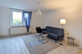 Wohnung kaufen in 18516 Süderholz, Wohnen und Investieren: 2 3-Zi.-Wohnungen + Garagen, Garten & Bungalow in Süderholz