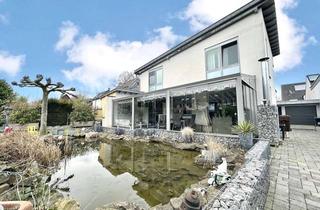 Mehrfamilienhaus kaufen in 41470 Neuss, Architektenhaus und Mehrfamilienhaus auf großem Grundstück in gefragter Wohnlage