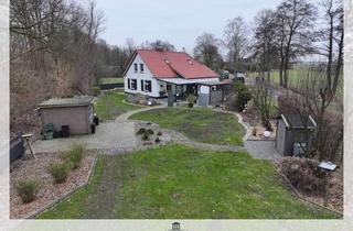 Einfamilienhaus kaufen in 26632 Ihlow, Saniertes, top gepflegtes Einfamilienhaus mit Carport, überdachter Terrasse und Gartenanlage in idyl