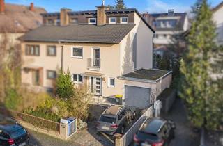 Doppelhaushälfte kaufen in 64546 Mörfelden-Walldorf, Attraktive Doppelhaushälfte mit besonderer Split-Level-Architektur in Mörfelden